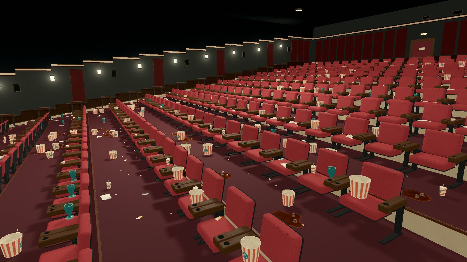 Rows of red seats after a showing, with popcorn buckets, cups and soda spills left behind.